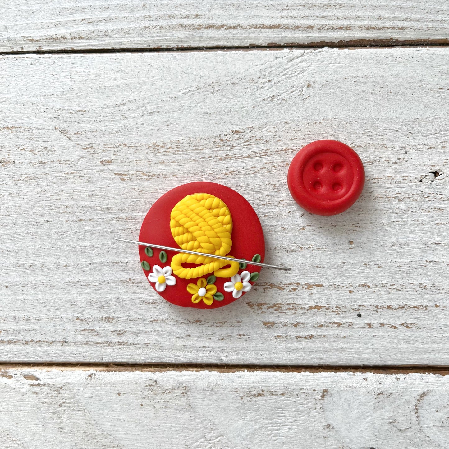 Red and yellow yarn ball magnetic needle minder, sewing magnets