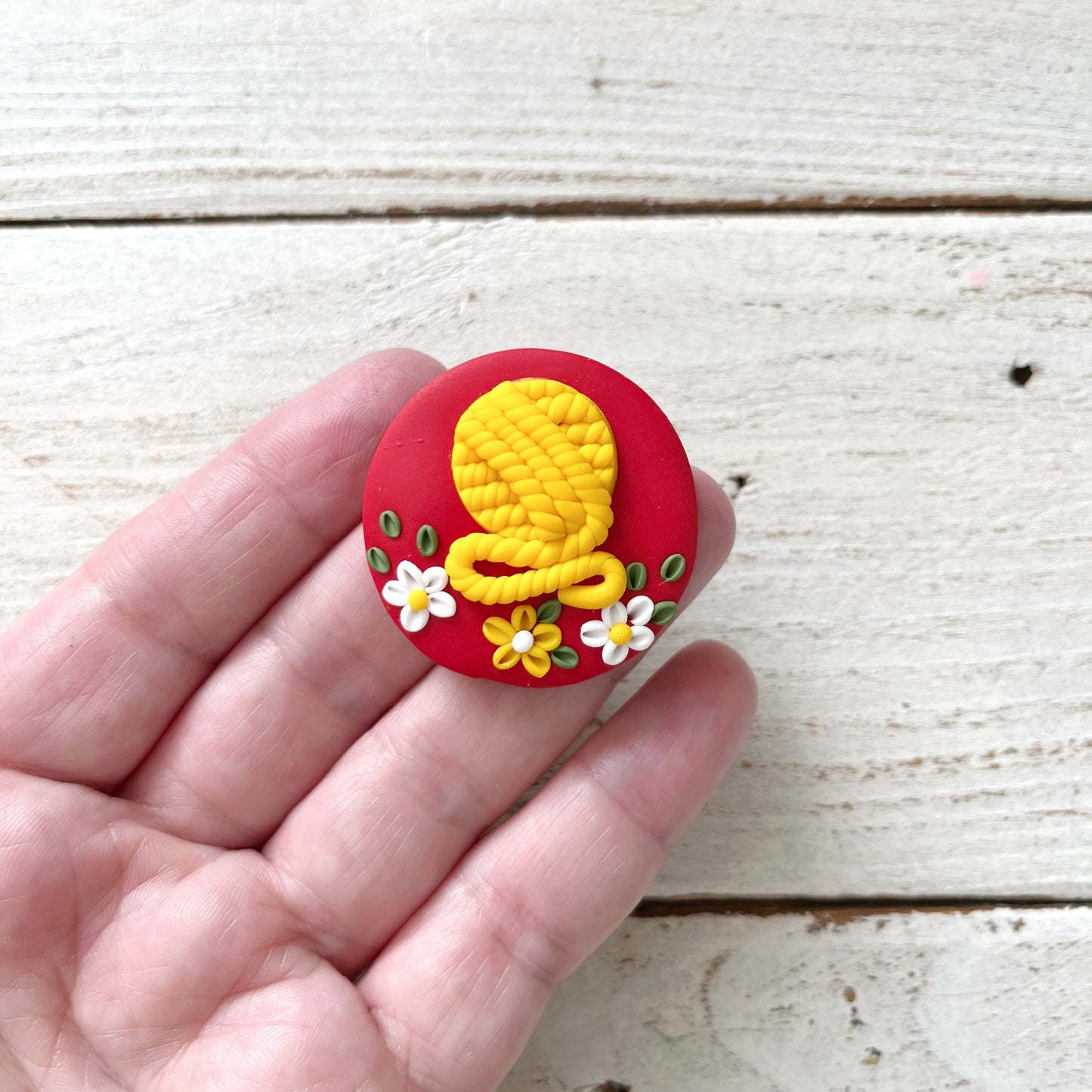 Red and yellow yarn ball magnetic needle minder, sewing magnets